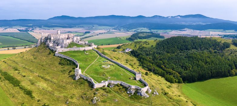 Aerial view of Spis (Spiš, Spišský) castle, Unesco Wold Heritage, Slovakia, second biggest medieval castle in Middle Europe.