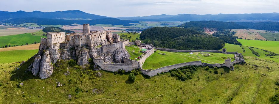 Aerial view of Spis (Spiš, Spišský) castle, Unesco Wold Heritage, Slovakia, second biggest medieval castle in Middle Europe.