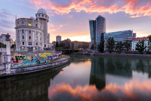 The Danube Canal in Vienna at Night with Urania and Uniqa Tower, Vienna, Austria