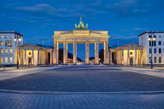 Panorama of the illuminated Brandenburger Tor in Berlin at dawn with no people
