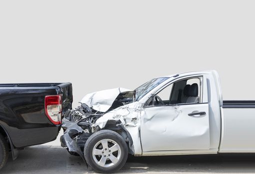 Front White color pack up car crash with back side black color car get damaged by accident on city street. isolate on gray background