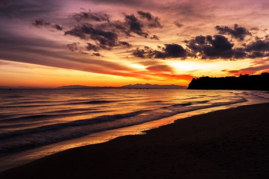 The sky on fire at sunrise on a beautiful island