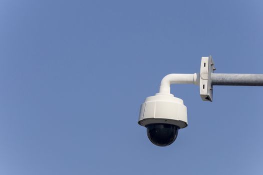 CCTV trafic camera on clear sky background with copy space for text or design.