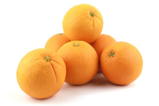 Fresh navel oranges isolated on white background. Save with clipping path.