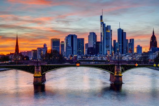Colorful sunset over downtown Frankfurt and the river Main