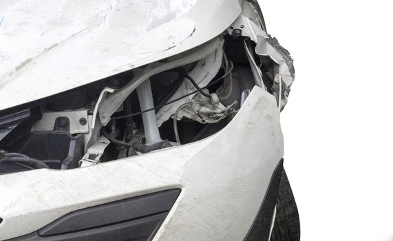 Close up head light of  white color car have damaged and broken by accident isolated on white background. Save with clipping path.