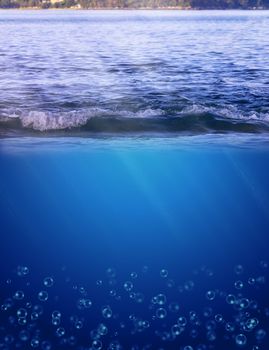 Sea water with underwater background. With copy space for text or design.