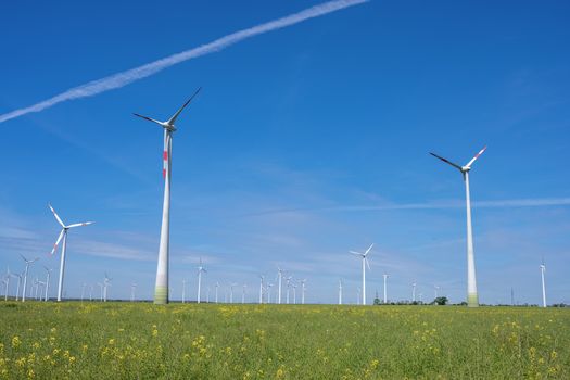 Wind energy generators in an agricultural field seen in Germany