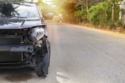 Front of black color car damaged and broken by accident . Isolate on white background. Save with cliping path