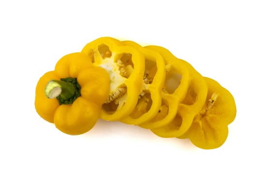 Slide fresh yellow bell pepper. Sweet pepper. Giant pepper. Isolate on white background. Save with clipping path.