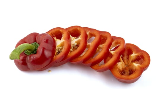 Slide fresh red bell pepper. Sweet pepper. Giant pepper. Isolate on white background. Save with clipping path.