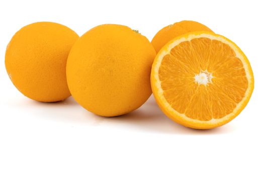 Fresh navel oranges isolated on white background. Save with clipping path.
