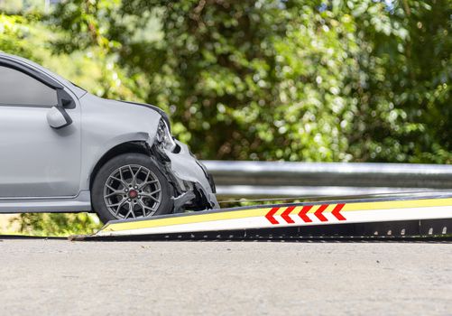 accident Car Slide on  truck for move.  car have damage by accident on road take with slide truck move . 
