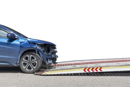 accident Car Slide on  truck for move. Blue car have damage by accident on road take with slide truck move . Isolate on white background save with clipping path.