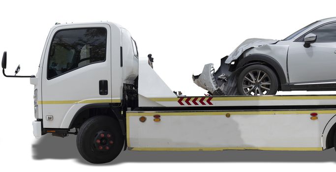 accident Car Slide on truck for move. Gray car have damage by accident on road take with slide truck move . 