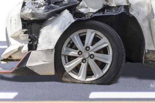 Broken tired, flat tire after front white car damaged and broken by accident isolated on white background. Save with clipping path. 