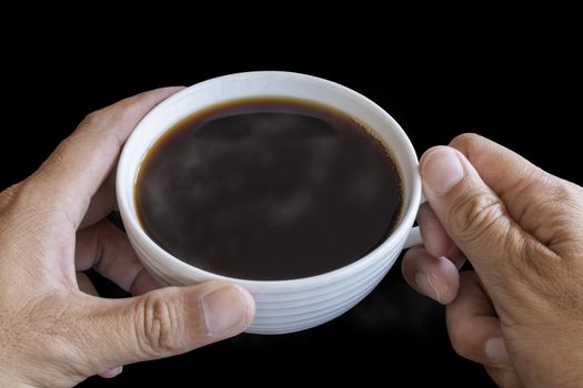 Two hand man hold the white coffee cup wiht hot black coffee in side. Save with clipping path. With copy space for text or desing