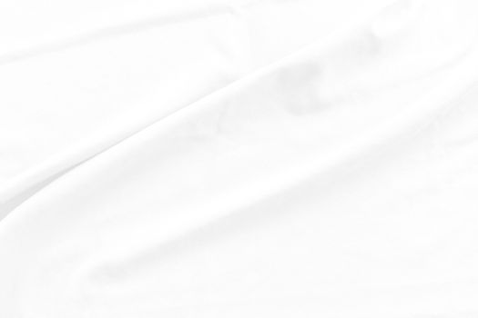 White cotton fabric texture background. Abstract white fabric with rippled background.White fabric with soft wave.  Soft focus technique. 