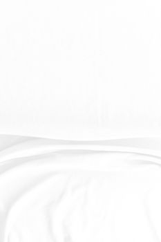 White cotton fabric texture background. Abstract white fabric with rippled background.White fabric with soft wave.  Soft focus technique. 