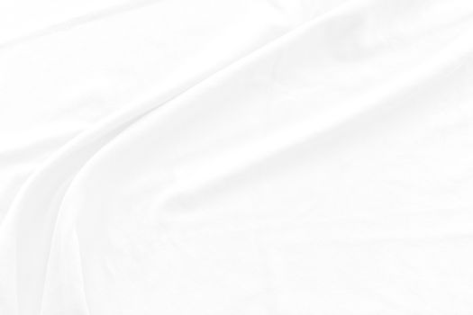 White cotton fabric texture background. Abstract white fabric with rippled background.White fabric with soft wave.  Soft focus technique. 