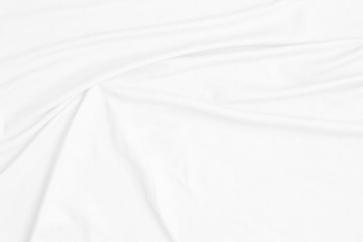 White cotton fabric texture background. Abstract white fabric with rippled background.White fabric with soft wave.  Soft focus technique. 