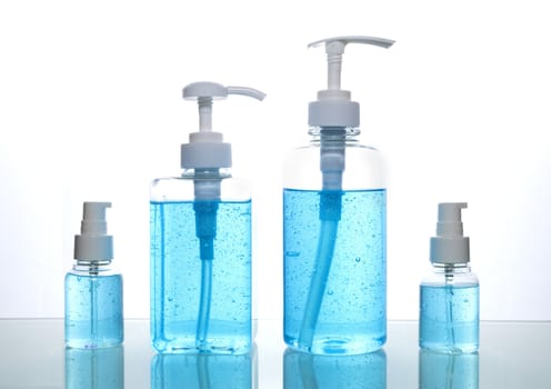 Blue alcohol gel isolated on white background. Hand sanitizer gel for clean. Hand sanitizer in 3 different size pump bottle. 