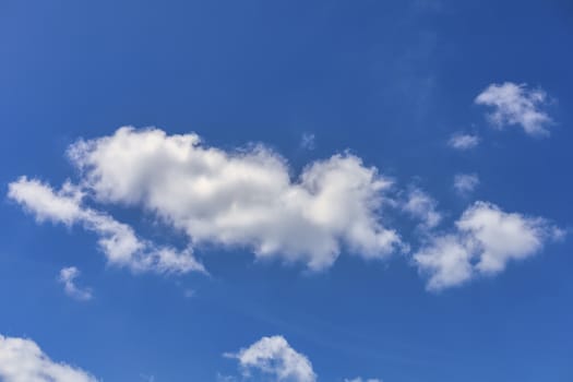 Blue sky with cloud background. With copy space for text or design.
