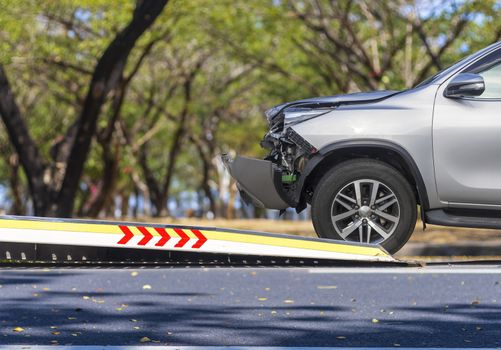 accident Car Slide on  truck for move. Gray car have damage by accident on road take with slide truck move . Isolate on white background.