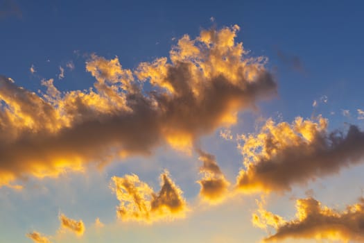 Sky with cloud and sun ray yellow and blue color background. With copy space for text or design.