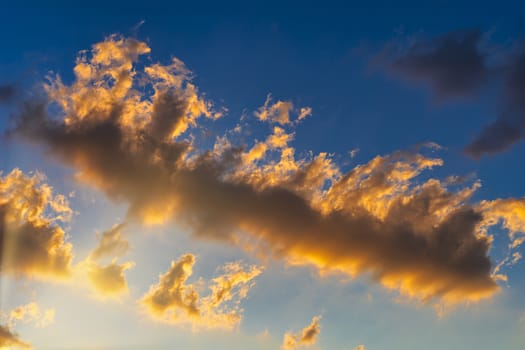Sky with cloud and sun ray yellow and blue color background. With copy space for text or design.