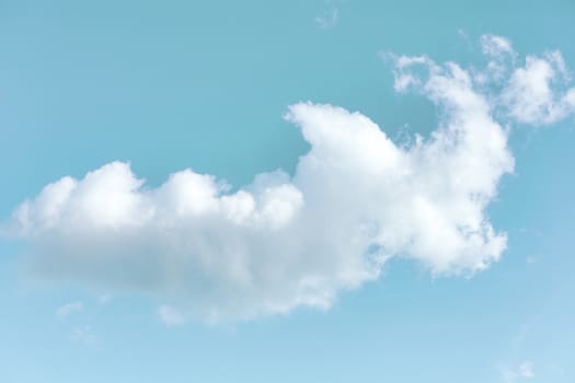 Soft blue sky with cloud background. With copy space for text or design.