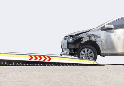 accident Car Slide on  truck for move. Gray car have damage by accident on road take with slide truck move . Isolate on white background.
