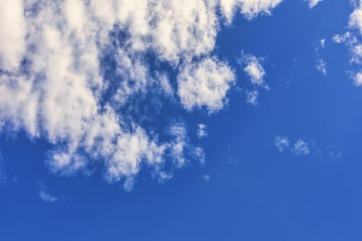 Blue sky with cloud background. With copy space for text or design.