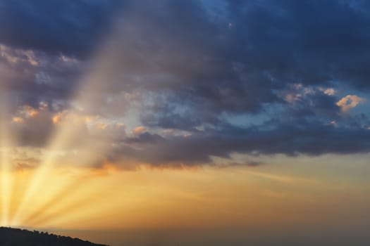 Sky with cloud and sun ray yellow and blue color background. With copy space for text or design.
