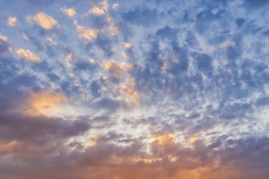 Sky with cloud and sun ray yellow and blue color background. With copy space for text or design.