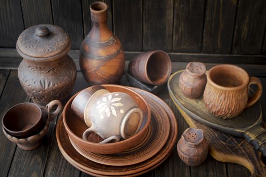 Clay dishes. A set of pots made of clay . Belarus traditional pattern.