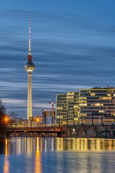 The famous Television Tower and the river Spree in Berlin at dusk