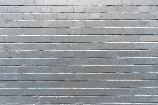 Background from a brick wall painted in silver