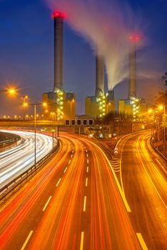 Power station and highway at dawn seen in Berlin, Germany