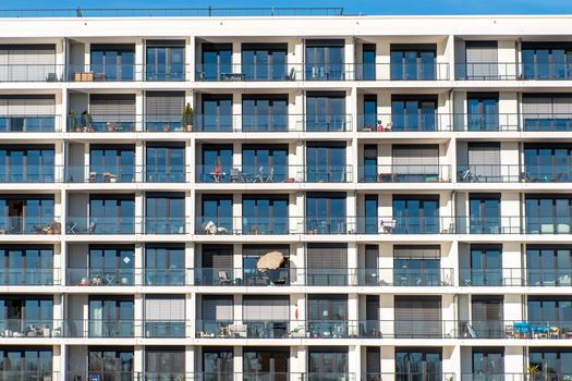 Facade of a modern apartment building with a lot of balconies seen in Hamburg, Germany