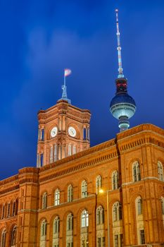 The town hall and the famous Television Tower in Berlin at night