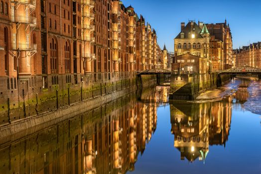 Old warehouses at the Speicherstadt in Hamburg, Germany, at dusk