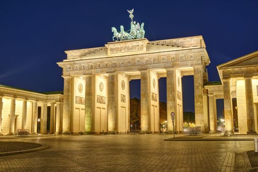 The famous Brandenburger Tor in Berlin illuminated at dawn