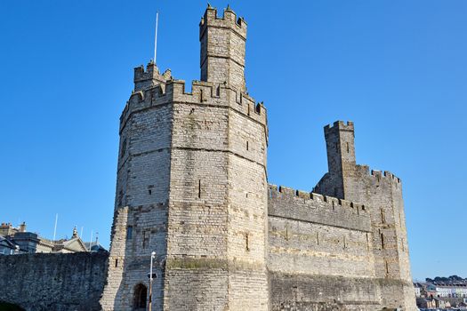 The Caernarfon Castle in North Wales on a sunny day