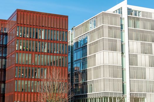 Modern red and white office buildings seen at the Hafencity in Hamburg