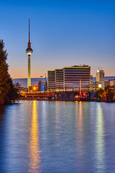 The famous Television Tower and the river Spree in Berlin at twilight