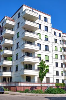 Modern white block of flats seen in Berlin, Germany
