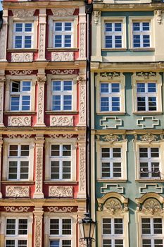 Detail of a colorful house facade seen on the main square in Wroclaw, Poland