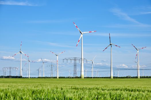 Wind wheels and overhead power lines seen in Germany