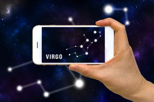 Concept of augmented reality, AR, of Virgo zodiac constellation app on smartphone.